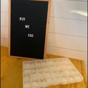 Letter board with extra letters. Organized bin.